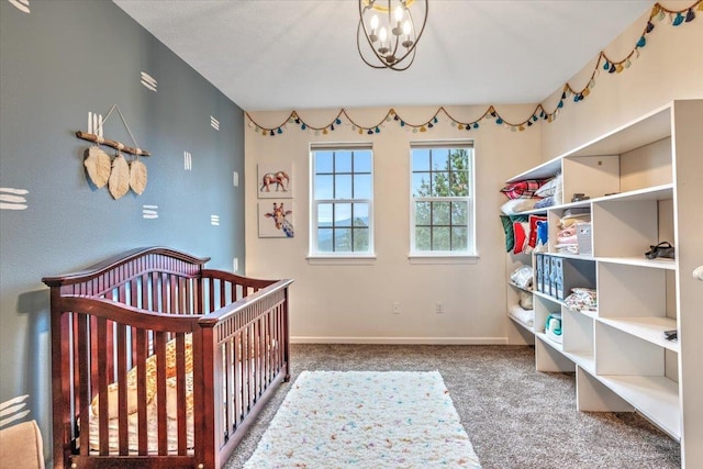 6808 S Jackson Ridge Ln, Greenacres, WA 99016 - carpeted bedroom with a crib and baseboards
