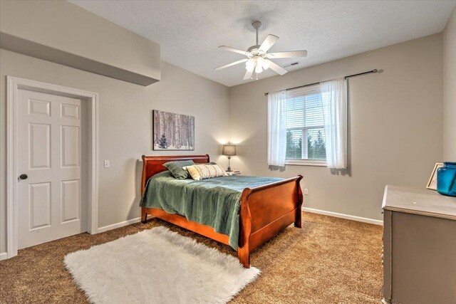 6808 S Jackson Ridge Ln, Greenacres, WA 99016 - bedroom with carpet floors, a textured ceiling, and a ceiling fan