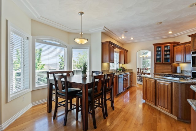 8708 E Redwood Ln, Spokane, WA 99217 - dining room featuring plenty of natural light and light wood-style flooring