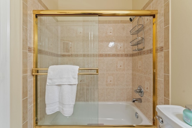 8708 E Redwood Ln, Spokane, WA 99217 - bathroom featuring combined bath / shower with glass door and toilet