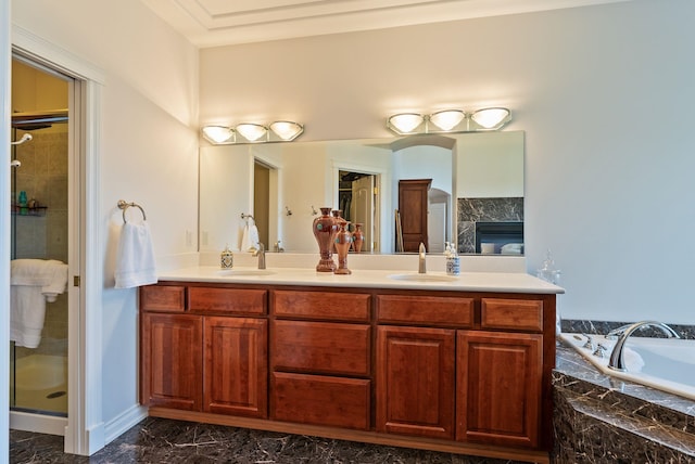 8708 E Redwood Ln, Spokane, WA 99217 - bathroom with marble look tiles, a stall shower, double vanity, and a bath