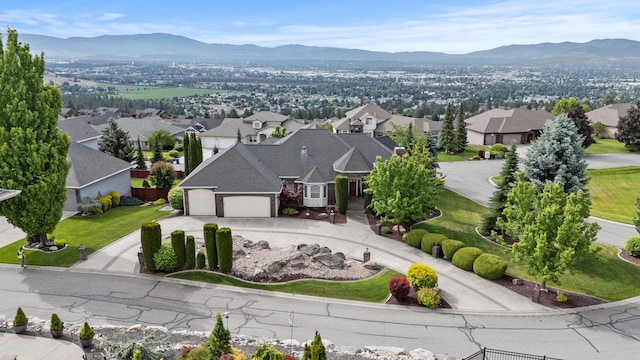 8708 E Redwood Ln, Spokane, WA 99217 - aerial view of residential area featuring a mountainous background
