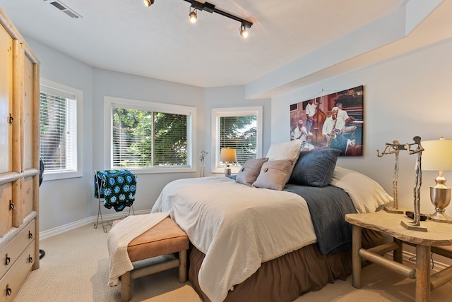 8708 E Redwood Ln, Spokane, WA 99217 - bedroom with light carpet and baseboards