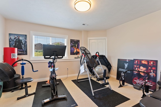8708 E Redwood Ln, Spokane, WA 99217 - workout area with baseboards and carpet