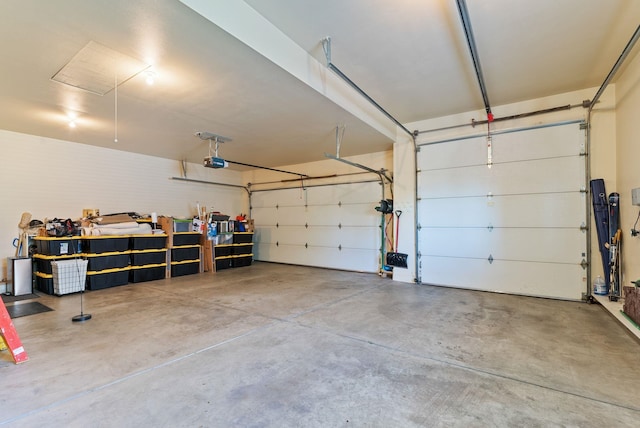 8708 E Redwood Ln, Spokane, WA 99217 - garage featuring a garage door opener