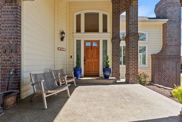 8708 E Redwood Ln, Spokane, WA 99217 - doorway to property featuring a porch