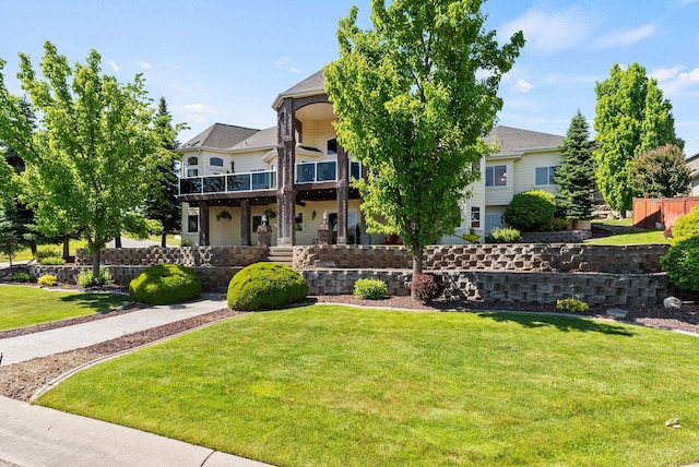 8708 E Redwood Ln, Spokane, WA 99217 - view of front of property with a balcony and a front yard