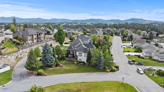 8708 E Redwood Ln, Spokane, WA 99217 - aerial perspective of suburban area featuring a mountain backdrop