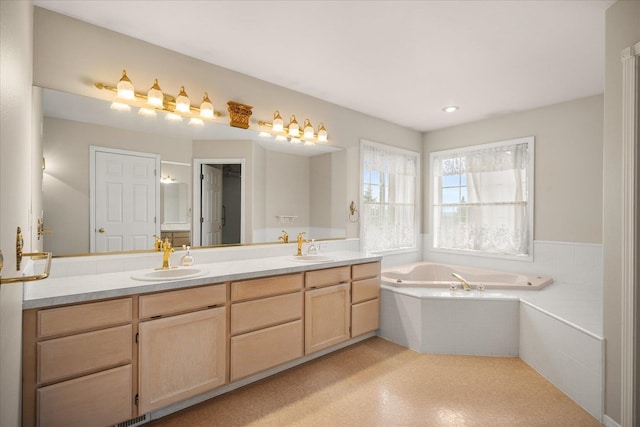 6419 W Skagit Ave, Spokane, WA 99208 - bathroom with double vanity and a bath