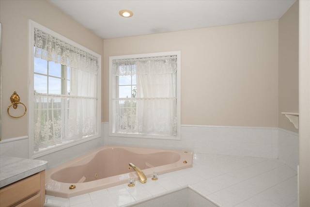 6419 W Skagit Ave, Spokane, WA 99208 - bathroom featuring a whirlpool tub and vanity