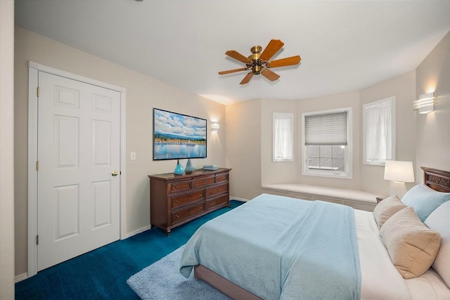 6419 W Skagit Ave, Spokane, WA 99208 - carpeted bedroom with ceiling fan and baseboards