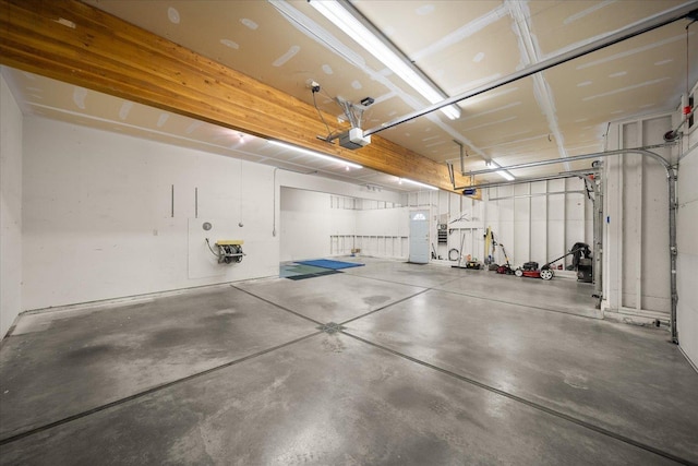 6419 W Skagit Ave, Spokane, WA 99208 - garage featuring a garage door opener