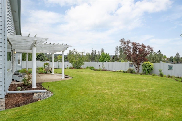 6419 W Skagit Ave, Spokane, WA 99208 - fenced backyard featuring a pergola and a patio area