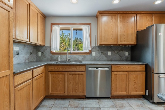 13908 E 32nd Ave, Spokane Valley, WA 99037 - kitchen featuring appliances with stainless steel finishes, tasteful backsplash, recessed lighting, and brown cabinetry