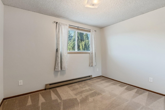 13908 E 32nd Ave, Spokane Valley, WA 99037 - carpeted spare room featuring baseboard heating and a textured ceiling