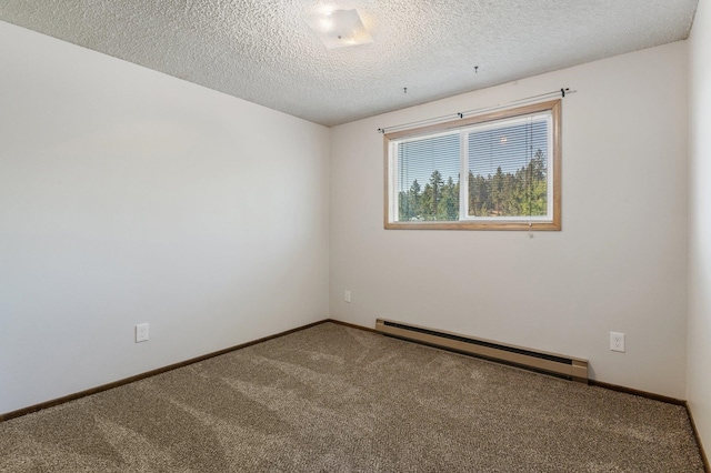 13908 E 32nd Ave, Spokane Valley, WA 99037 - carpeted empty room with baseboard heating and a textured ceiling