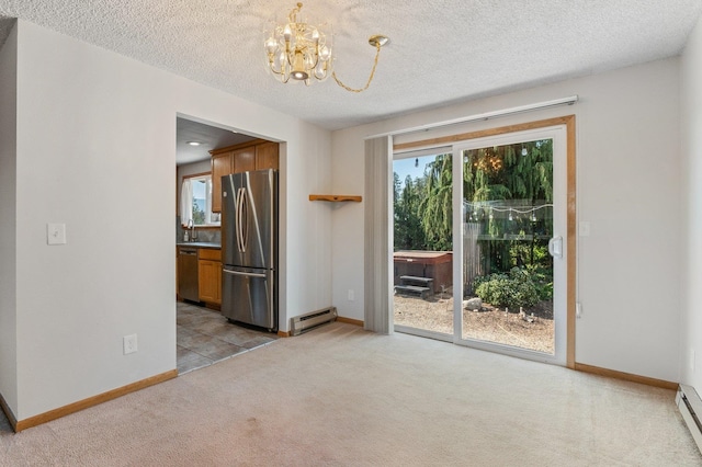 13908 E 32nd Ave, Spokane Valley, WA 99037 - unfurnished dining area with a chandelier, light colored carpet, baseboard heating, and a textured ceiling