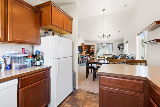19020 E Euclid Ave, Otis Orchards, WA 99037 - kitchen with white appliances, a chandelier, light countertops, brown cabinets, and lofted ceiling