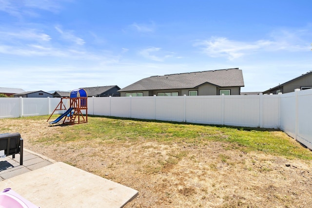 19020 E Euclid Ave, Otis Orchards, WA 99037 - fenced backyard with a playground and a patio area
