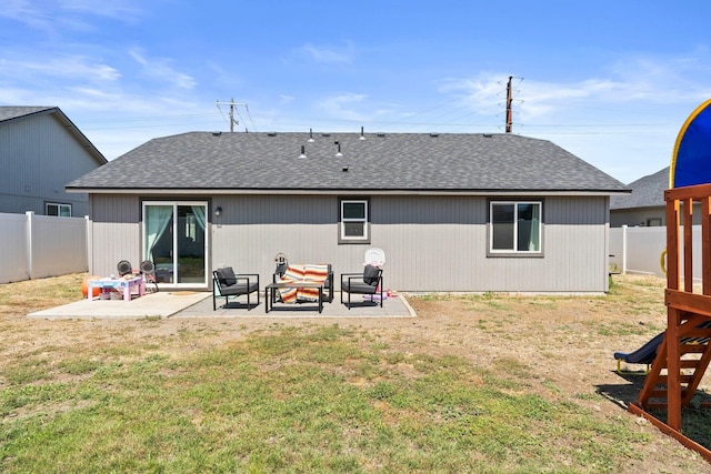 19020 E Euclid Ave, Otis Orchards, WA 99037 - rear view of property featuring roof with shingles, a patio area, and a fenced backyard