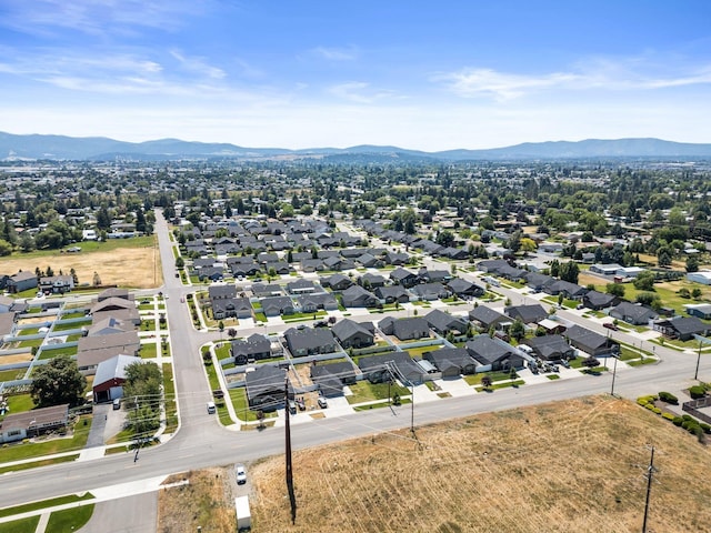 19020 E Euclid Ave, Otis Orchards, WA 99037 - aerial perspective of suburban area featuring a mountainous background