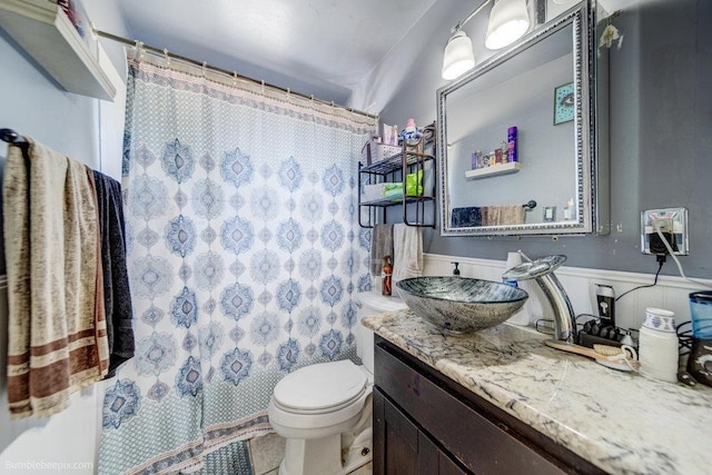 803 E Queen Ave, Spokane, WA 99207 - bathroom with vanity and a shower with curtain