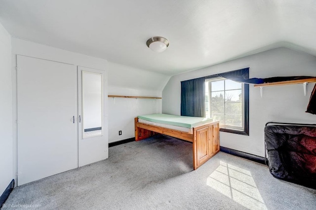 803 E Queen Ave, Spokane, WA 99207 - bedroom with lofted ceiling and light carpet
