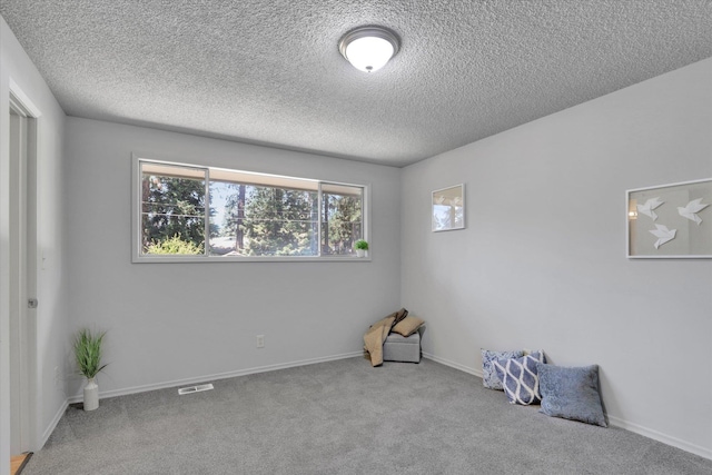 13709 E 30th Ave, Spokane Valley, WA 99216 - spare room with carpet flooring and a textured ceiling