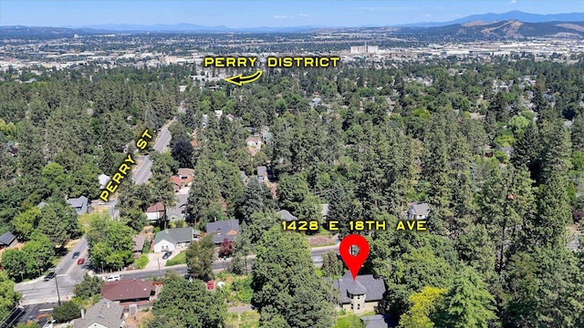 1428 E 18th Ave, Spokane, WA 99203 - aerial view of property and surrounding area with a mountainous background and a forest