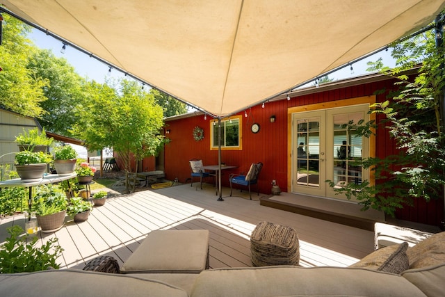 447 E Dakota Ave, Hayden, ID 83835 - view of patio / terrace with a deck, french doors, and outdoor dining area