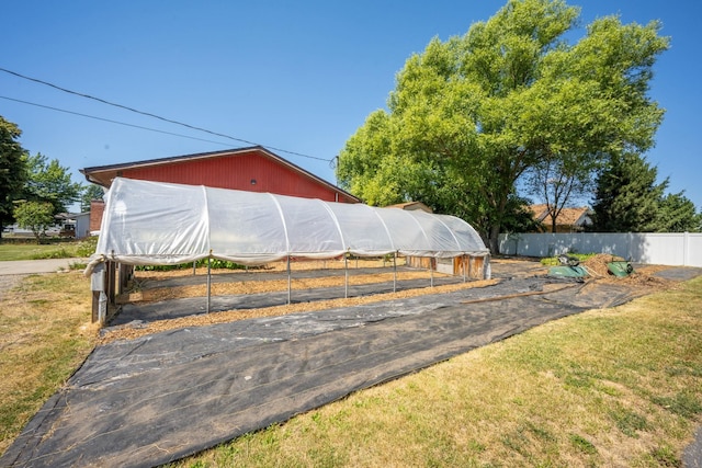 447 E Dakota Ave, Hayden, ID 83835 - view of yard featuring a greenhouse and an outdoor structure