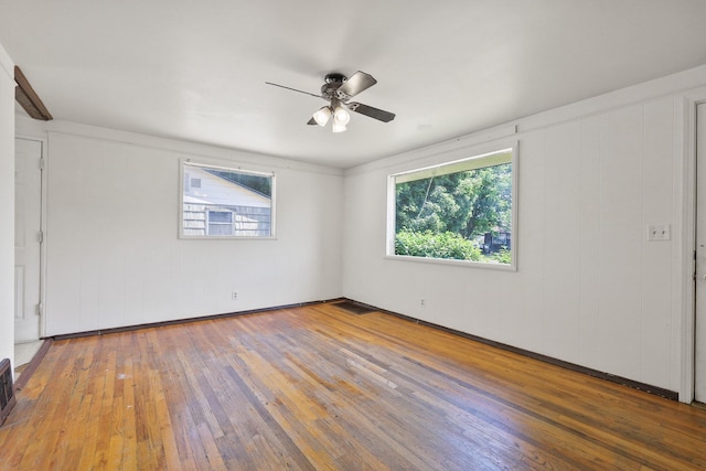 1647 E Decatur Ave, Spokane, WA 99208 - unfurnished bedroom with wood-type flooring and ceiling fan