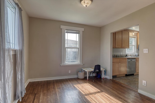 703 E Lacrosse Ave, Spokane, WA 99207 - unfurnished dining area featuring dark wood finished floors