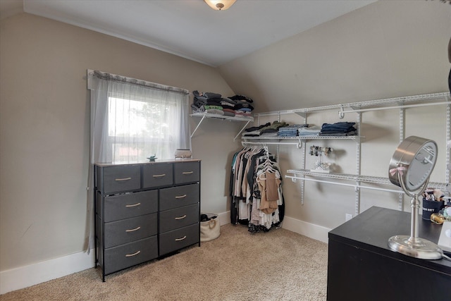703 E Lacrosse Ave, Spokane, WA 99207 - walk in closet with lofted ceiling and light carpet