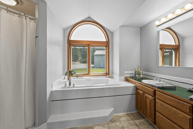 17607 E Judkins Rd, Spokane, WA 99217 - bathroom with lofted ceiling, vanity, a garden tub, and curtained shower