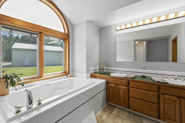 17607 E Judkins Rd, Spokane, WA 99217 - full bath featuring lofted ceiling, double vanity, and a bath