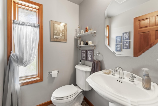 17607 E Judkins Rd, Spokane, WA 99217 - half bathroom featuring a sink and toilet