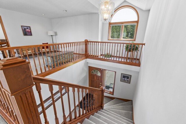 17607 E Judkins Rd, Spokane, WA 99217 - stairway with a chandelier