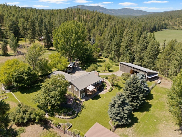 996A Basin Rd, Colville, WA 99114 - view from above of property with a heavily wooded area and a mountain backdrop