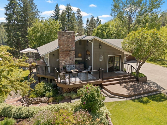 996A Basin Rd, Colville, WA 99114 - back of property featuring a deck and a chimney