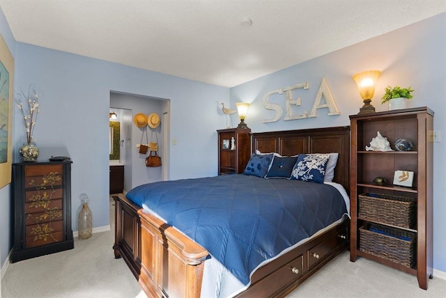 996A Basin Rd, Colville, WA 99114 - bedroom with light carpet and ensuite bath