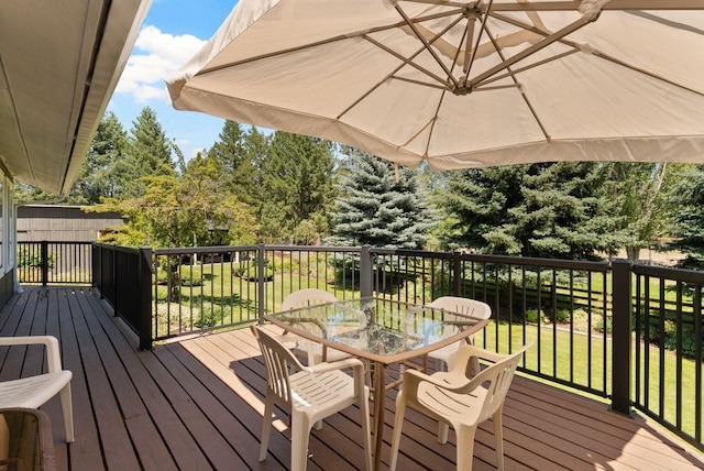 996A Basin Rd, Colville, WA 99114 - wooden deck with outdoor dining area and a yard