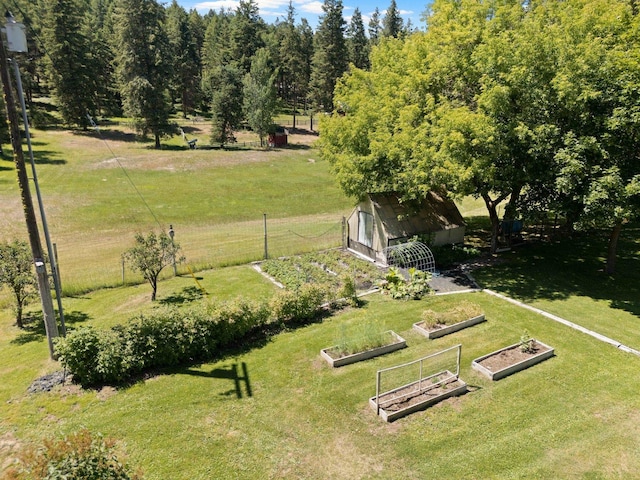 996A Basin Rd, Colville, WA 99114 - view of yard with a garden and a shed