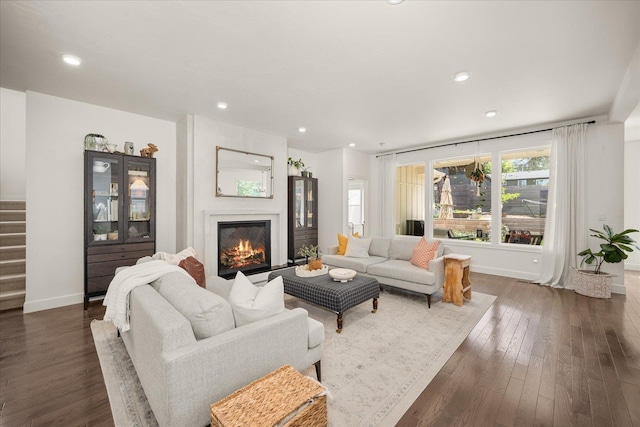 3103 W 18th Ave, Spokane, WA 99224 - living area featuring dark wood-style floors, a glass covered fireplace, recessed lighting, and stairway