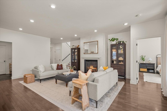 3103 W 18th Ave, Spokane, WA 99224 - living area featuring stairway, dark wood-type flooring, a glass covered fireplace, and recessed lighting