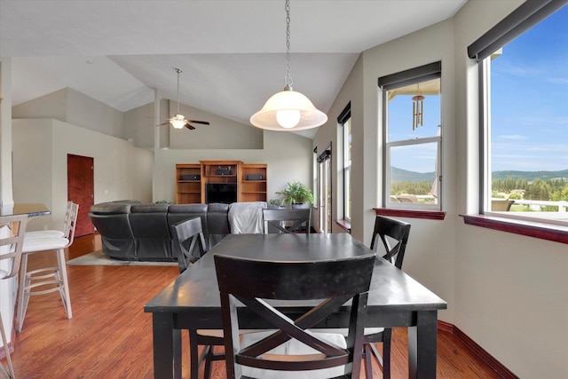 2716 S Man O War Ln, Veradale, WA 99037 - dining area with wood finished floors, ceiling fan, and vaulted ceiling