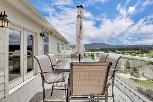 2716 S Man O War Ln, Veradale, WA 99037 - deck with a mountain view, grilling area, and outdoor dining space