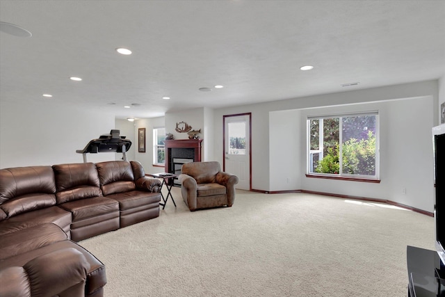 2716 S Man O War Ln, Veradale, WA 99037 - carpeted living room featuring a glass covered fireplace and recessed lighting