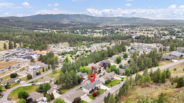 2716 S Man O War Ln, Veradale, WA 99037 - aerial overview of property's location with mountains and nearby suburban area