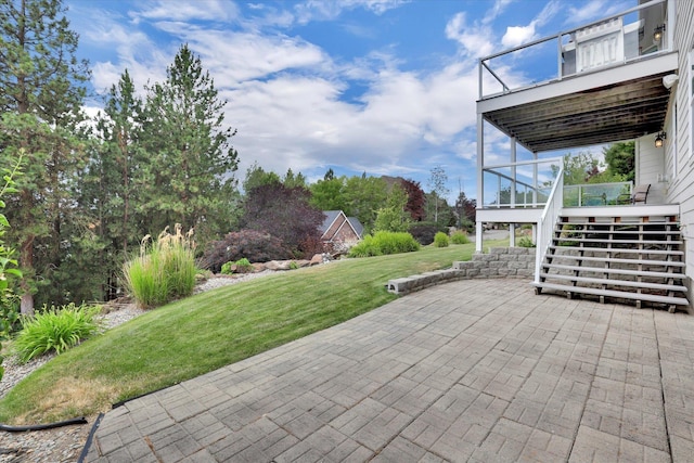 2716 S Man O War Ln, Veradale, WA 99037 - patio / terrace with a patio area, a lawn, stairs, and a sunroom